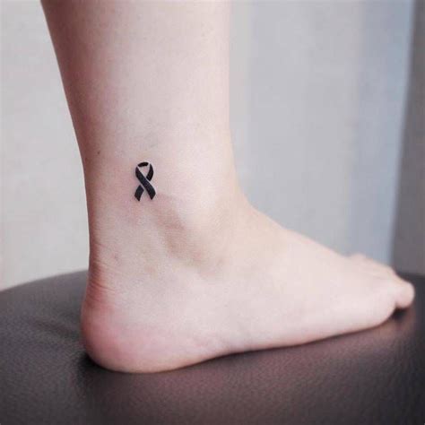 Minimalist simple cancer ribbon tattoos - 13. “I lost my friend to suicide. This is her laugh converted in to sound waves. I will never forget her laugh and I loved hearing it so had it tattooed on my arm.”. — Alison B. 14. “My personal reminder to keep breathing through my anxiety attacks and keep fighting my suicidal thoughts daily.
